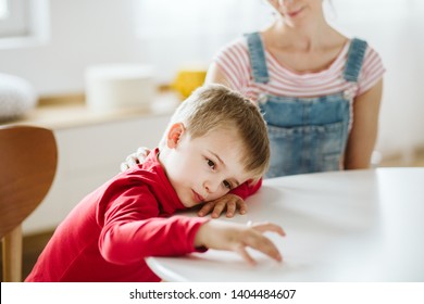 Kid with ADHD don't paying attention to his mother - Powered by Shutterstock