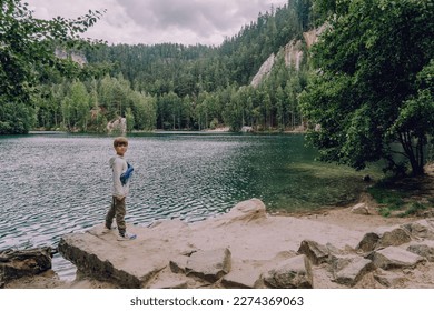 Kid at Adrspach-Teplice Rocks, nature adventure