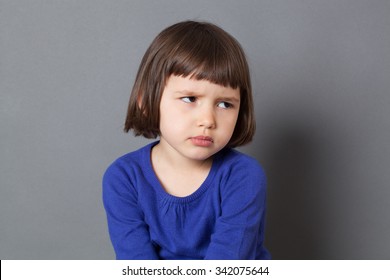 Kid Attitude Concept - Grumpy 4-year Old Child With Bob Cut Sulking With Dirty Look For Complain Or Disagreement,studio Shot