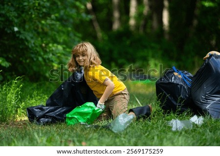 Similar – Image, Stock Photo Eco activist boy with banner “Wind Energy” on background of power stations for renewable electric energy production. Child and windmills. Wind turbines for generation electricity. Green energy