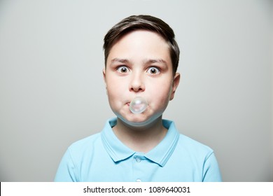 Kid Blowing Bubble Gum