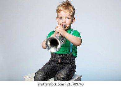 Kid Blowing Trumpet