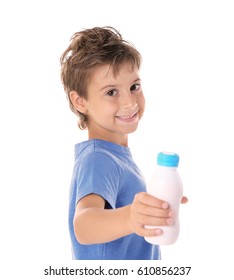 Kid In Blue Shirt Holding Plastic Bottle Of Milk On White Background