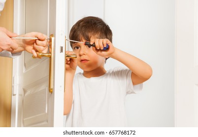 Kid Boy Drawing Up Bolt Of Door Handle