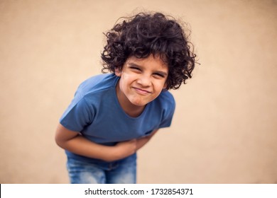 Kid Boy Feels Strong Stomach Ache. Children, Healthcare And Medicine Concept