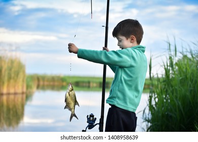 Kid Boy Hold Fish On Fishing Stock Photo (Edit Now) 1408958639