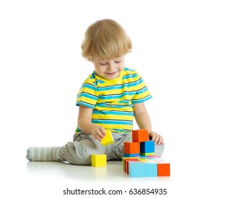 Kid Boy Playing Toy Blocks Isolated Over White