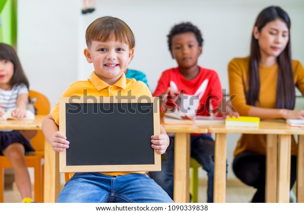 Kid Boy Thumbs Holding Blackboard Back Stock Photo Edit Now