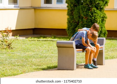 Kid Comforting Consoling Upset Sad Boy In School Yard