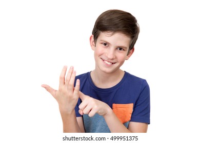 A Kid Is Counting By Fingers, Isolated On White Background