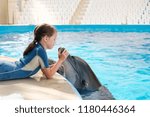 Kid and Dolphin. playing bottlenose dolphin. Dolphin Assisted Therapy