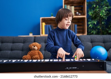 Kid Down Syndrome Playing Piano Sitting Stock Photo 2168612773 ...