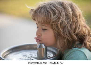 Kid Drinking Water From Outdoor Water Fountain Outdoor. Thirsty Child.