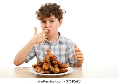 Kid Eating Chicken Drumsticks Isolated On White