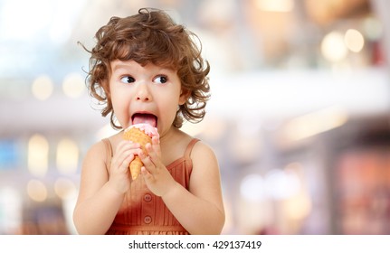 Kid Eating Ice Cream In Cafe. Funy Curly Child With Icecream Outdoor.