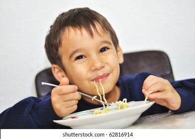 Kid Eating Spaghetti