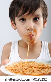 Kid Eating Spaghetti