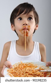 Kid Eating Spaghetti