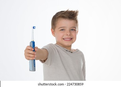 Kid Exhibits His Brand New Electric Toothbrush