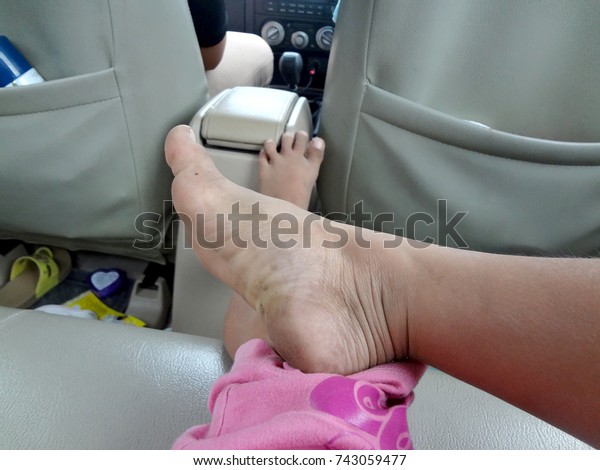 kid  feet in car. Fall trip.  Freedom weekend
travel concept.