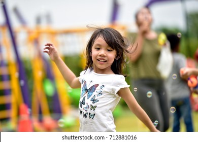 Kid and friends in international preschool play a bubble in playground , kid, child, school ,education preschool concept . - Powered by Shutterstock