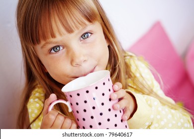 Kid Girl Drinking Milk From Cup