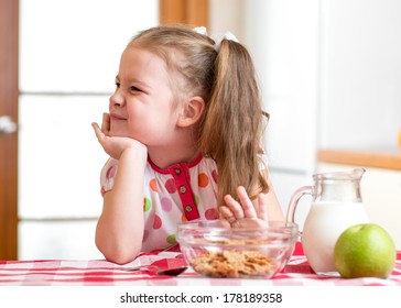 kid girl refuses to eat healthy food