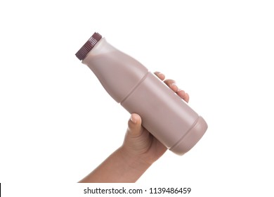 Kid Hand Holding Bottle Of Fresh Milk Chocolate Isolated On White Background.