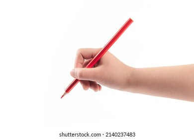 Kid hand holding pencil  writing drawing  isolated white background 