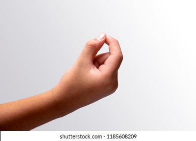 A Kid Hand Holding Something On White Backgrounds, Isolated.