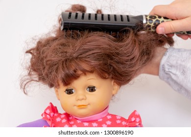 combing doll hair