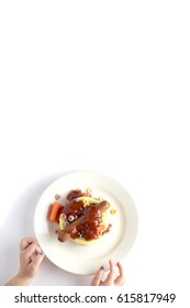 Kid Hands Reaching For Ketchup Hotdog With Cereal