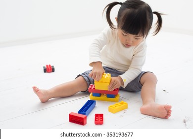 kid having fun with blocks