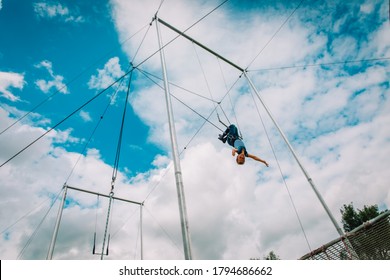 Kid Having Swing On A High Flying Trapeze, Boy Learning Acrobatic