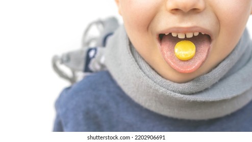 Kid Hold On Tongue Anaesthetic Sore Throat Lozenges For Pain Redness Irritation Treatment.isolated On White Child With Scarf Around Neck.sweet Candy Yellow Color Lemon Honey Ingredients.wide Banner