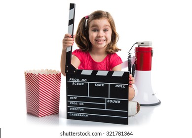 Kid holding a clapperboard