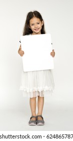 Kid Holding Empty Paper Board For Advertising