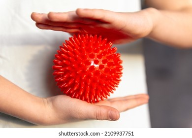 Kid Holding Massage Ball Physical Therapy And Massage