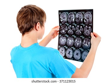 Kid Holding X-ray Scan On The White Background