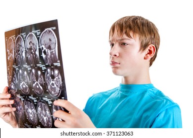 Kid Holding X-ray Scan On The White Background