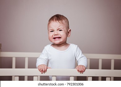 The Kid Holds On To The Crib, Takes Offense, Cries, Is Nervous.