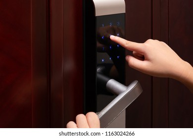 Kid Inputing Passwords On An Electronic Door Lock