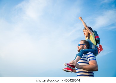 Kid With Jet Pack Pretend To Be Superhero. Child Playing With Father In Summer. Happy Dad And Son Outdoors. Success, Leader And Winner Concept