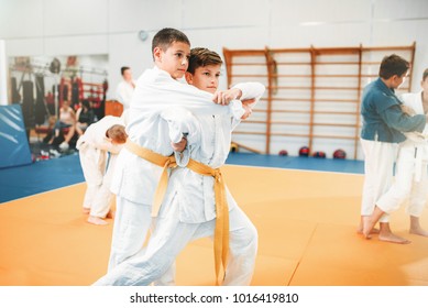 Kid judo, childrens training martial art in hall