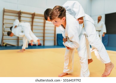 Kid judo, young fighters on training, self-defense