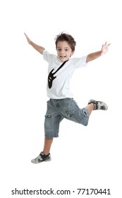 A kid jumping in the air, with a nice tshirt with a guitar painted on it. Isolated on white.
