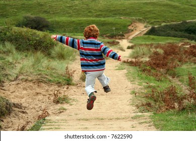 Kid Jumping Outside