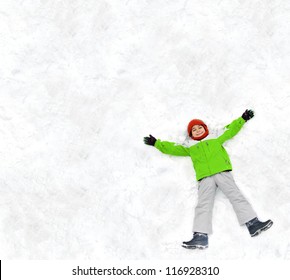 Kid Making A Snow Angel