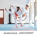 Kid, master or kick in martial arts dojo for training, fighting exercise or karate club education. Learning skill, practice or judo teacher with girl child in studio for taekwondo lesson or workout