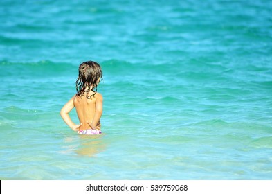 kid in the ocean